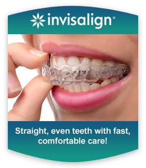 A woman putting invisalign on her teeth.